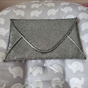 Silver sparkling clutch bag